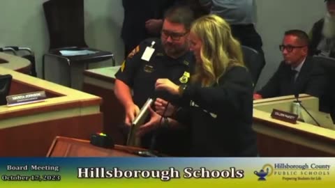Cop stops mom from exposing what's in book available to kids, school district panics