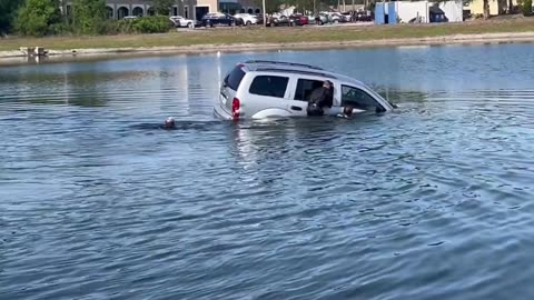 Elderly Driver Rescued From Sinking Car