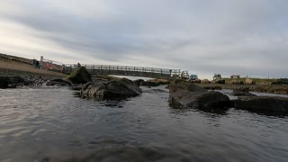 Bridge over a beautiful river by the sea. GoPro