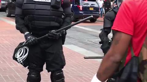 Aug 17 2019 Portland 1.9 antifa members taunt black police calling them a race traitor