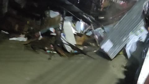 Man and House Get Washed Under Bridge During a Flood