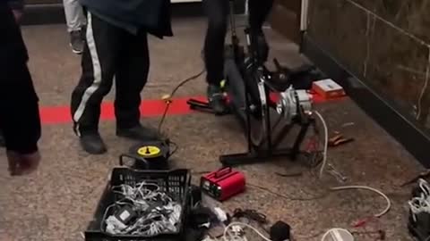 Christmas lights at a train station in Kiev, Ukraine, are powered by a bicycle.