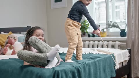 Babies playing with a cat 😂🤣