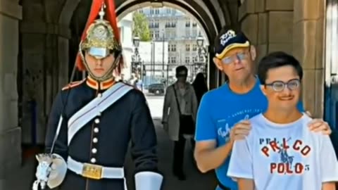 Father makes sure his autistic son doesn't get too close to the royal guard and then this happens