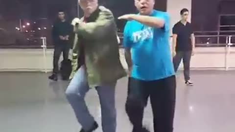 Two Elderly Men Show Off Some Smooth Dance Moves, Getting To The Groove