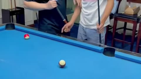 Funny chinese playing 8 ball pool