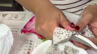 Cutting the Dragon fruit