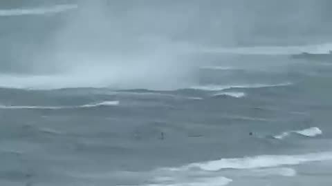 Footage captures waterspout ripping through crowded beach Shorts