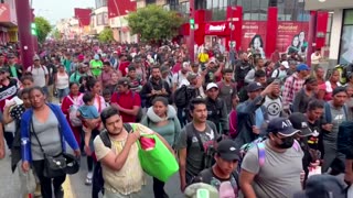 Thousands of migrants head to Mexico city seeking U.S. asylum