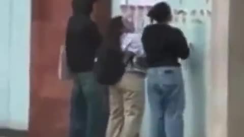 Students were filmed ripping down posters of those kidnapped by Hamas