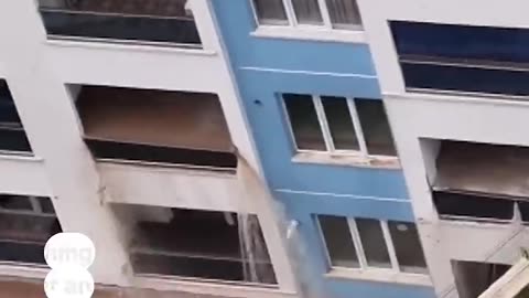 Flood waters gush through Ankara building