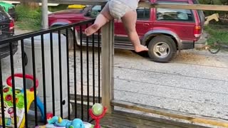 Acrobatic Toddler Can't Be Contained by Fence