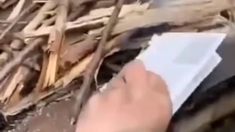 Ukraine soldiers burning Quran & using as cutting board for Bacon