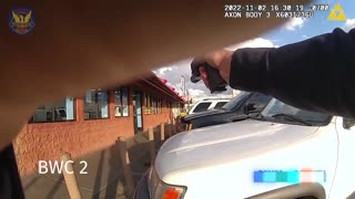 Bodycam shows Phoenix officers shooting suspect armed with a gun at a strip mall parking