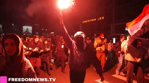 Pro-palestine Protesters LIGHT FLARES, march through China Town in NYC