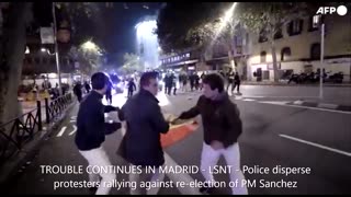 TROUBLE CONTINUES IN MADRID - Police disperse protesters