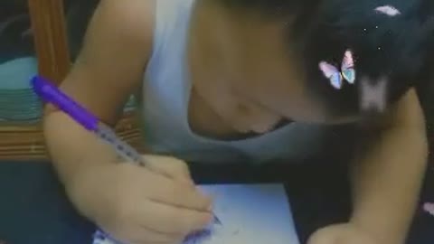 Cute Baby Writing on Paper