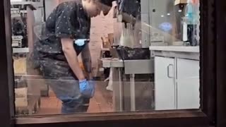 Worker At Taco Bell Is High On Something And Keeps Hitting Head