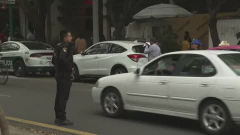 People on streets after 58 earthquake in central Mexico