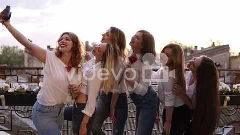 Beautiful, Glamour Women In Jeans And White Shirts On A Terrace