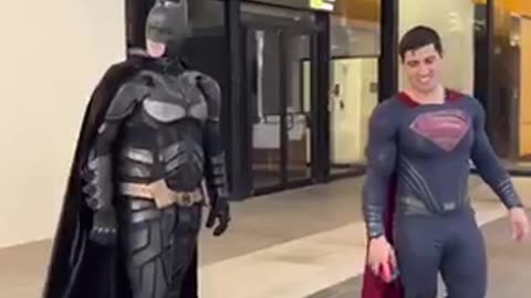 super hero action in public