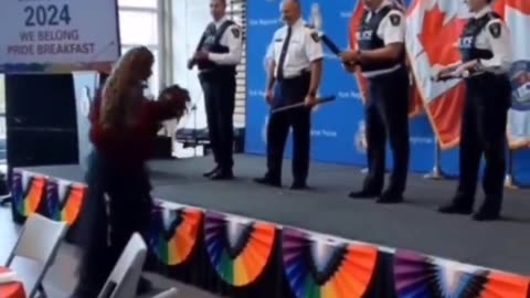 New York police enjoying a DRAG QUEEN show.....GAAAAAAY