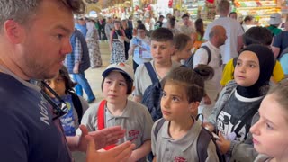 Talking to Turkish kids in the Spice Bazaar in Istanbul, Turkey