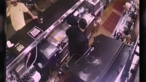 terrifying CCTV of television falling on bartender.. what happened? #shorts