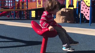 Spinning Toddler Takes A Tumble