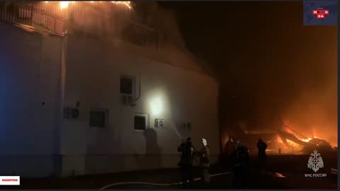 Russian warehouse burns after possible Ukrainian drone strike