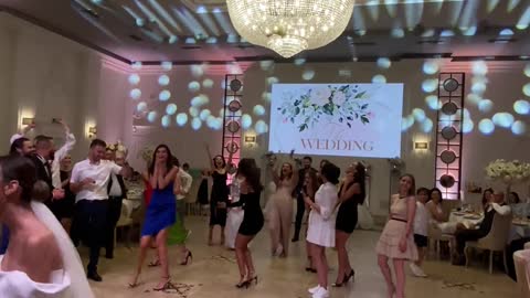 Bride's Bouquet Gets Stuck in Chandelier