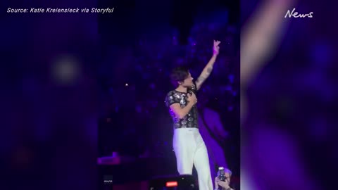 Harry Styles struck by skittles thrown during LA concert