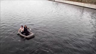 Concrete boat floating on water