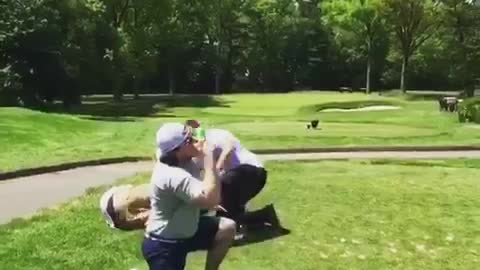 Golfer swings at ball on beer can misses gets tackled and beer chug