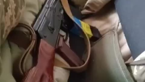 Ukraine soldiers using a school as shelter and to store weapons