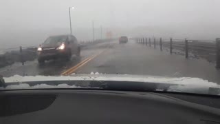 Big Wave Crashes Into Car