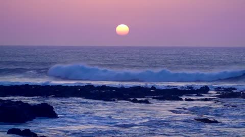 The sea at sunset and the colors of the sky