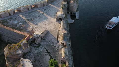 Odd-shaped building in the middle of the sea