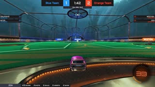 Playing the game, rocket league.