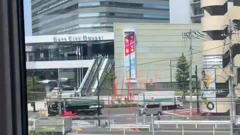 Japanese city view from inside the train