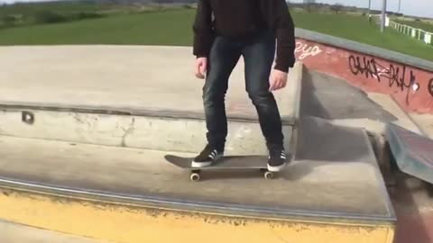 Skateboard head hits bueno ledge