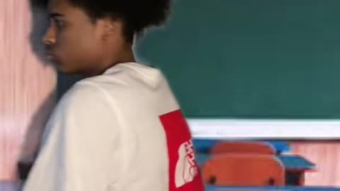 You sit behind that student.