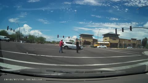 Car Runs Red Light Causing Intersection Accident