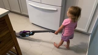 Vacuuming her worries away