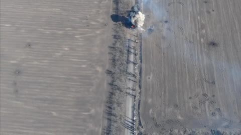 A tank explodes after passing a mine planted by the Ukrainian army in Donetsk