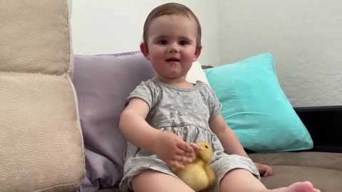 Cute_Baby_Zlata_Meets_the_Duckling_for_the_First_Time