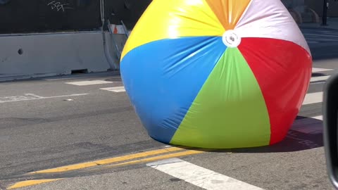 Giant Beach Ball Rolling By