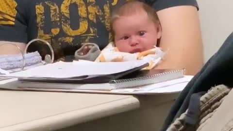 Baby Left Perplexed By Dad's Study Guide