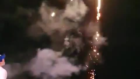 Small fireworks display in the night sea