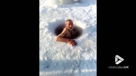 Older Gentleman Dives 20 Meters Into Frozen Waters
